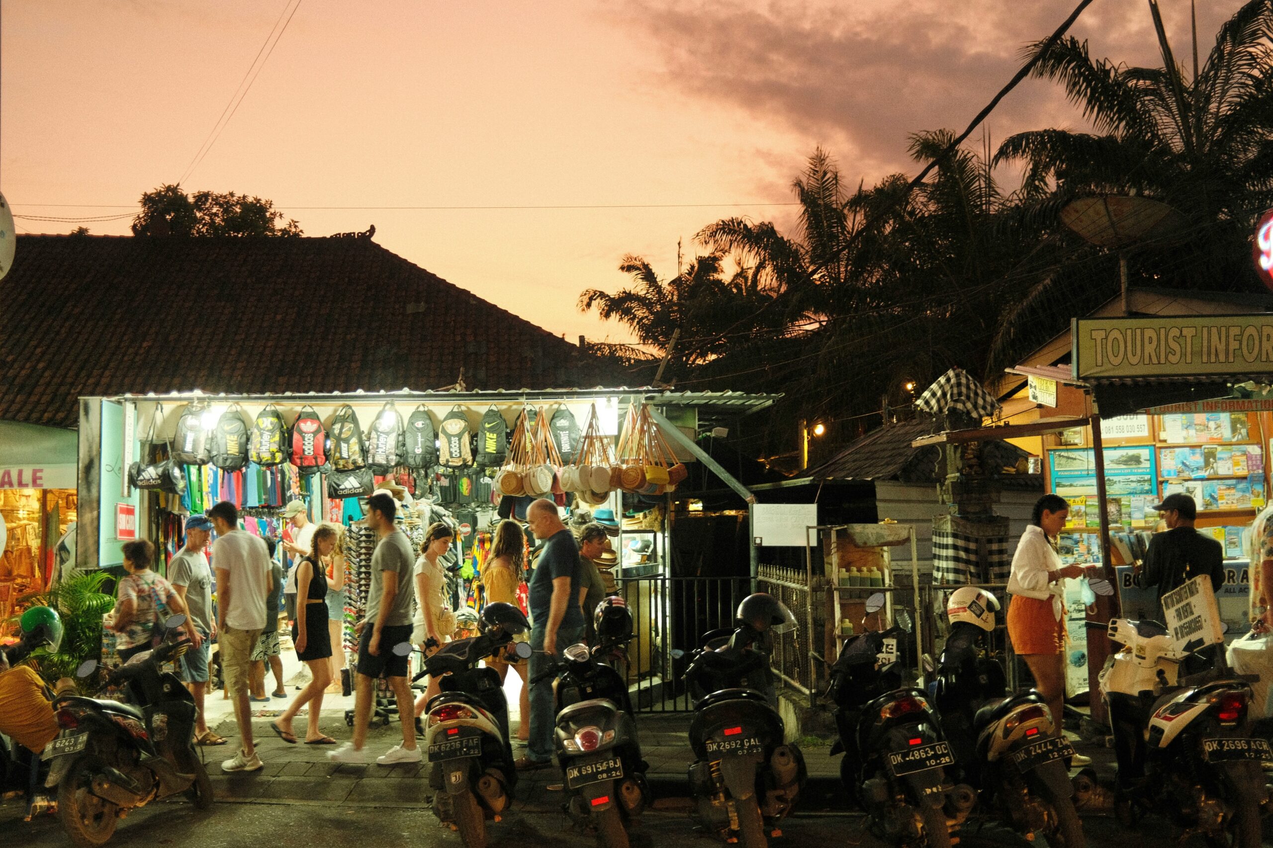 https://unsplash.com/photos/a-group-of-people-stand-outside-a-shop-cwZxZ2rCrs0?utm_source=unsplash&utm_medium=referral&utm_content=creditShareLink